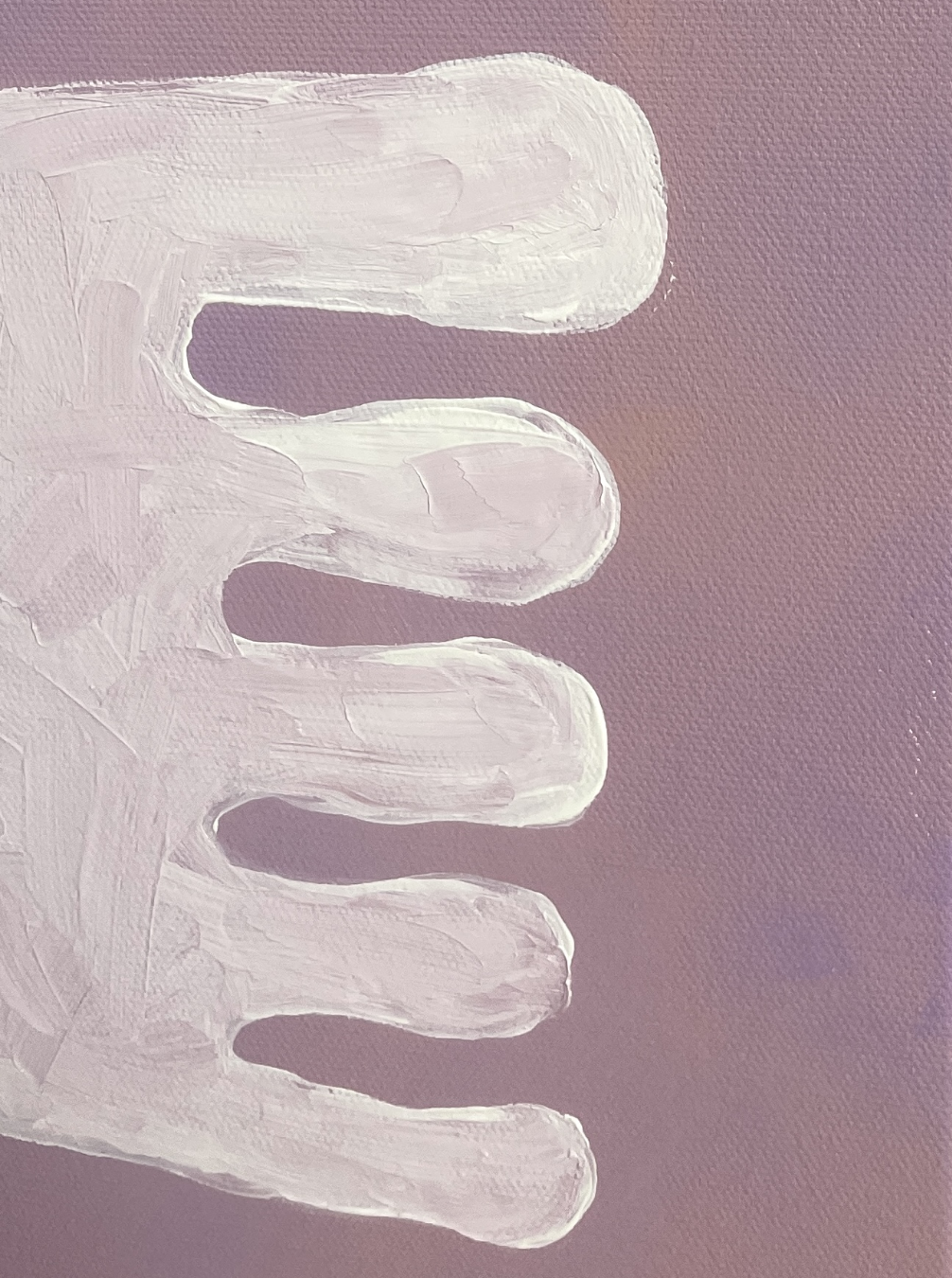 White foot painting close-up on lavender canvas